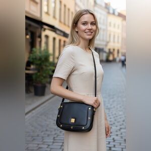MCM Black Crossbody Bag with Gold Accents
